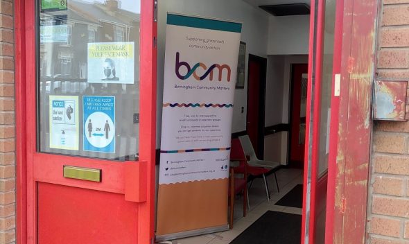 Red double doors: entrance to Soho Community Hall
